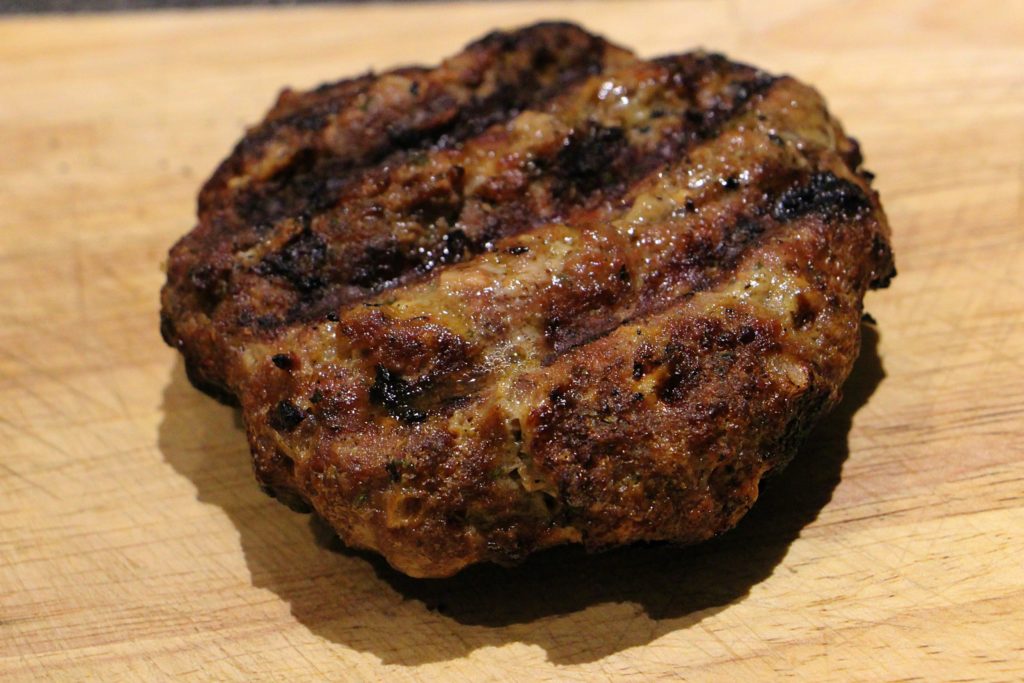 Cooked beef burger patty