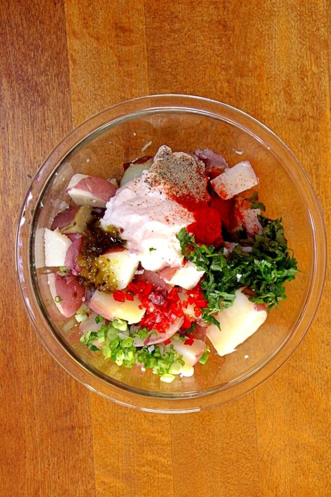 Potato salad ingredients in bowl