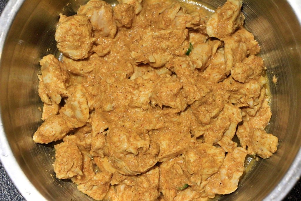 Partially cooked marinated chicken