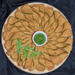 Baked arugula pesto bread wreath