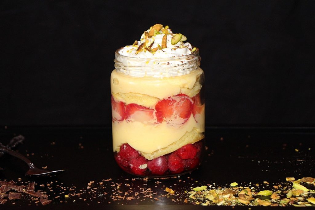 Individual trifle with custard and fresh berries
