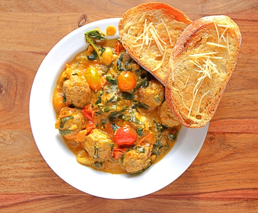 Curry Meatballs with Spinach and Cherry Tomatoes