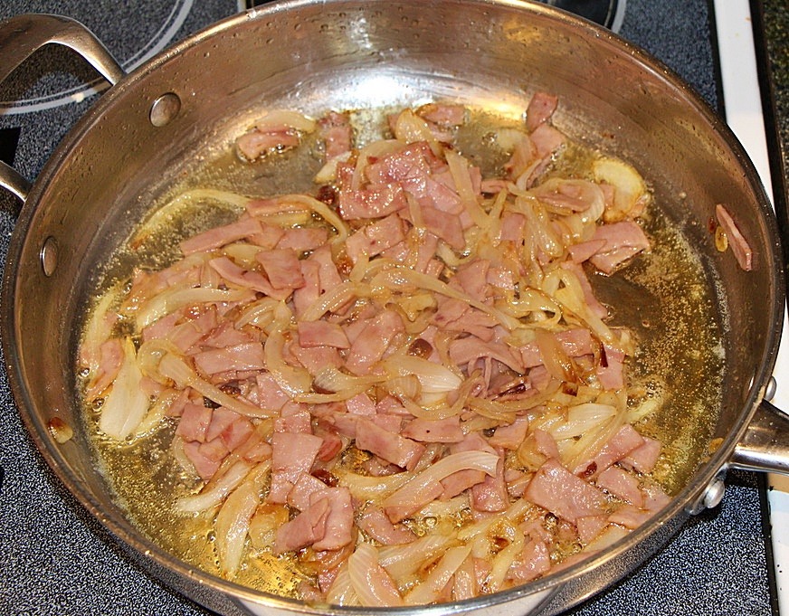 Onions and bacon in pan
