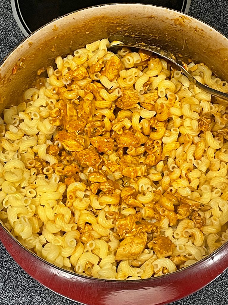Butter chicken mac and cheese in pan