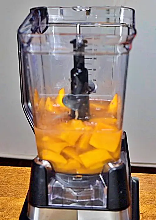 Mango agua fresca in a blender