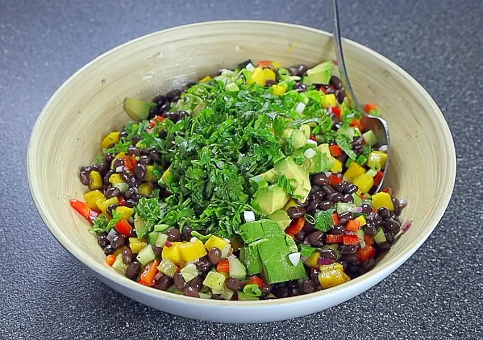 The avocado and herbs for bean salad